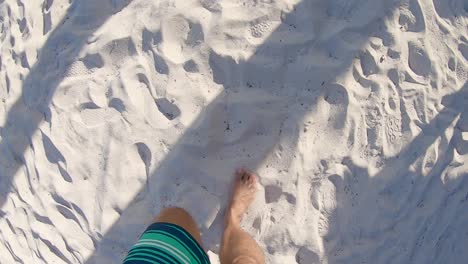 Walking-barefooted-on-soft-warm-sand