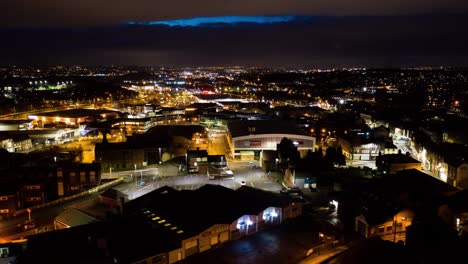 An-aerial-night-time-time-lapse,-timelapse-of-Fenton,-in-Stoke-on-Trent,-Staffordshire-in-the-heart-of-the-midlands,-panning-English-cityscape,-UK
