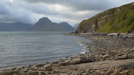 A-timelapse-of-the-Cuillin-mountain-range-as-viewed-from-Elgol,-with-stormy-cloud-movement-across-the-mountains