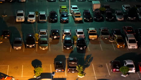 Nonthaburi-Thailand---Time-lapse-from-above-of-a-very-busy-parking-lot-at-night
