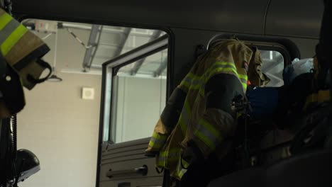 Firefighting-hanging-inside-a-fire-truck-ready-for-emergency-response