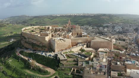 Citadella-the-historical-medieval-fortress-found-on-the-beautiful-island-of-Gozo,-Malta-in-4K---drone-aerial-shot