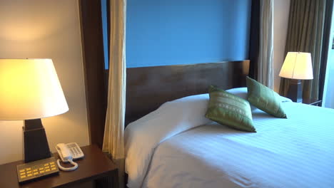 Footage-of-a-double-Bed-in-a-modern-Hotel-Room