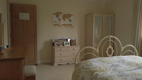 Left-to-Right-Pan-of-a-Modern-Looking-Bedroom-in-a-Rural-Home-in-Slow-Motion
