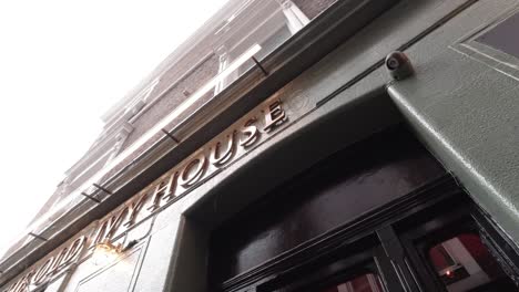 Rain-drops-during-summer-evening-out-of-pub-in-central-London-in-slow-motion