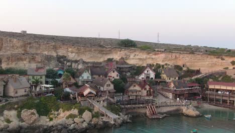 Popeye-Village-or-Sweethaven-village-in-Mellieha,-Malta,-Anchor-bay