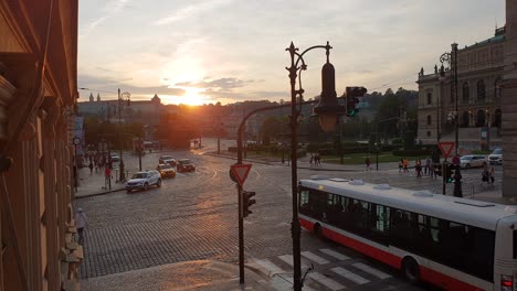 Prague-traffic-crossing-square-at-sunset