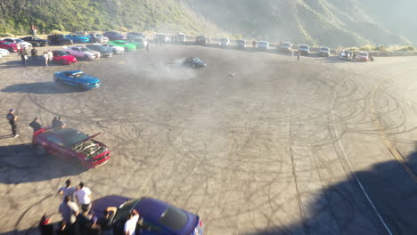 Muscle-and-sports-cars-doing-doughnuts-and-burnouts-with-a-car-club-in-the-Angeles-National-Forest-in-Southern-California