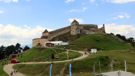 Tourist-walking-up-and-down-the-road-to-the-Rasnov-fortress-in-Romania