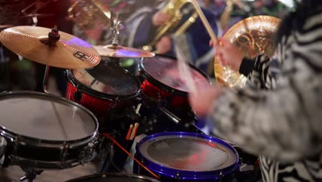 Close-up-shot-of-drummer-playing-drums-on-carnival-party-festival-at-stage