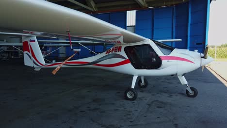 Light-sport-airplane-in-hangar,-Pipistrel-Virus-912,-private-propeller-aircraft