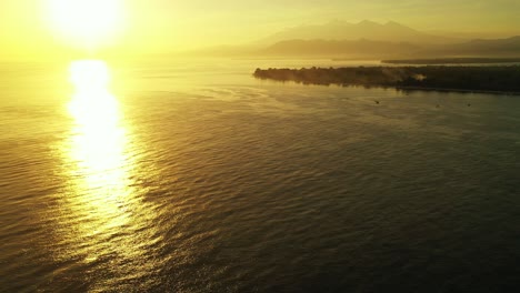Golden-sun-reflecting-on-the-calm-sea-surface