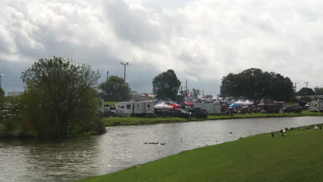 Wide-shot-of-BBQ-teams-tents-and-RVs-in-Lockhart,-Tx-at-a-BBQ-Competition