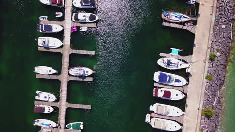 Aerial-over-sailboats-docked-in-a-marina