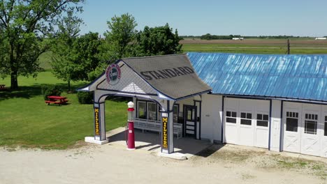 Old-Fashioned-Gas-Station-on-Route-66,-Aerial-Reveal
