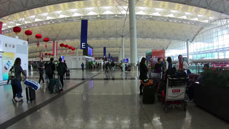 Hong-Kong-China,-circa-:-walking-or-moving-in-Hong-Kong-airport