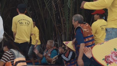 Vietnamese-Boat-Tour-Guides-Dancing-to-Break-Ice-with-Tourists