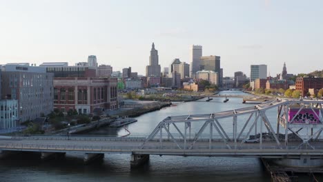 Downtown-Providence,-Rhode-Island-city-skyline-as-seen-from-down-river---sliding-aerial-view