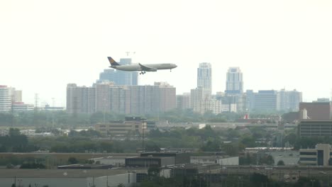 German-Lufthansa-airbus-airliner-approaching-international-airport-of-Toronto-during-cloudy-day