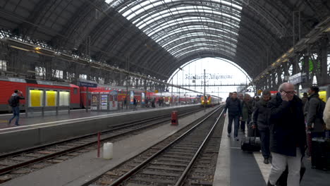 Slow-Motion:-People-walking-around-the-Frankfurt-Bahnhof-Station