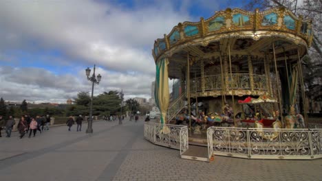 Carrousel,-Mery-go-round-in-Plaza-de-Oriente,-Palacio-Real