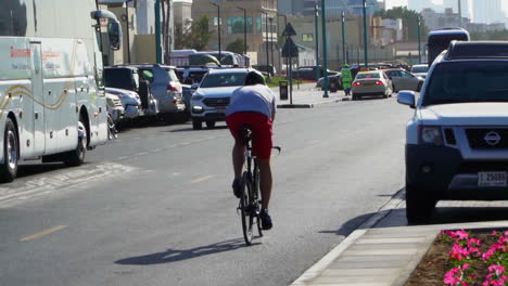Cyclist-with-a-backpack-reaching-the-finish-line