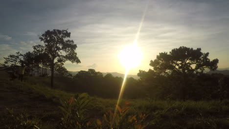 timelapse-of-beautiful-sunrise-on-moutain-with-people-walking-around