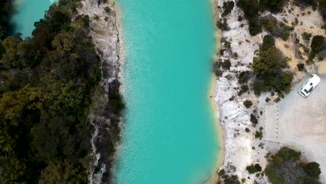 Aerial-of-Little-Blue-Lake-in-Mount-Cameron,-Tasmania,-Australia