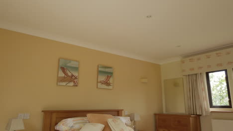 Upwards-Tilt-of-a-Contemporary-Guest-Bedroom