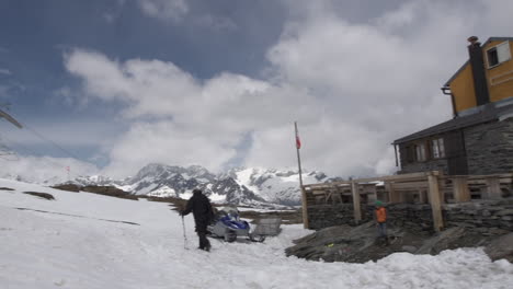 Pan-Shot-of-Mountain-hut-in-the-middle-of-the-glacier-area-surrounded-by-the-Zermatt