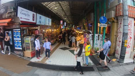 High-Angle-Shot-of-Tourists-at-Open-Air-Market,-Kokusai-dori