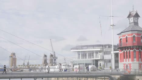 People-walking-on-a-bridge-in-the-distance-in-Cape-Town-V-A-Waterfront