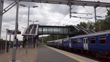 Northern-Train-Passing-Through-an-Empty-Commuter-Station-at-the-Weekend-Travelling-Towards-Camera