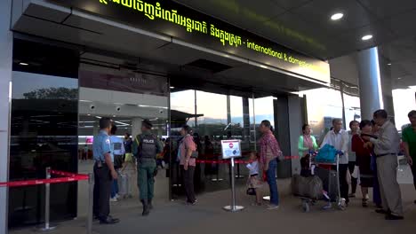 ,-Phnom-Pehn,-Cambodia:-entrance-of-Phnom-Pehn-international-airport-heavily-guarded-by-soldiers-in-anticipation-of-the-return-from-exile-of-the-opposition-party-leader