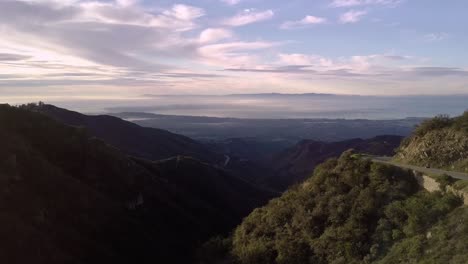 Forest-Hills-and-Roads-above-Santa-Barbara-at-Dawn,-Slow-Drone-Rise
