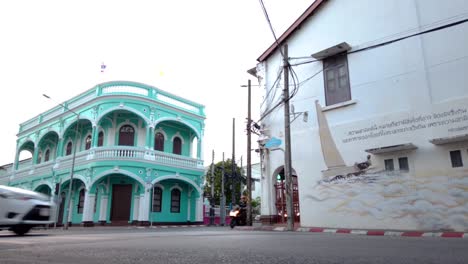 Hyperlapse-landscape-architecture-view-of-the-ancient-local-street-with-beautiful-shino-portuguese-architecture-town-house-building-in-Phuket-old-town-in-evening-sunset-time