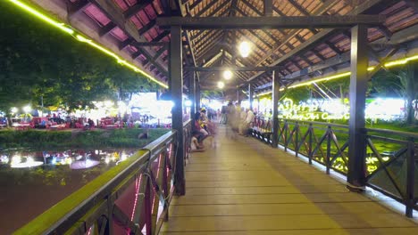 Time-Lapse-on-the-Illuminated-Bridge-next-to-the-Night-Market