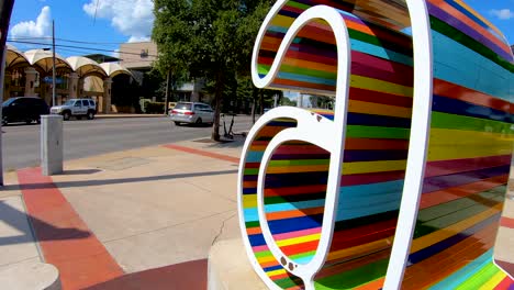 A-smooth-steady-push-in-shot-of-the-vibrant-ATX-sign-in-Austin-Texas