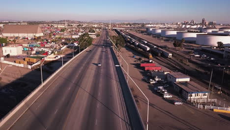 Aerial-view-of-the-wide-bridge-noncrowded-road-over-the-rail-yard-in-San-Pedro