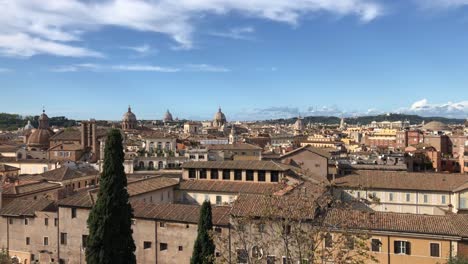 Panning-view-of-rooftops-in-Rome-on-a-sunny-day