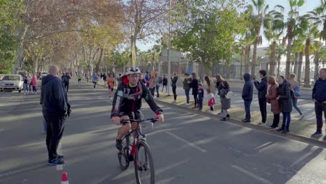 Participants-of-Zurich-Marathon-Malaga-run-towards-finish-line,-slow-motion