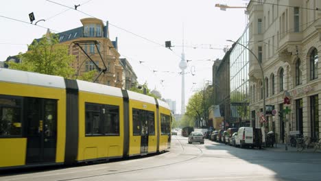 Yellow-Tram-on-Rails-on-Streets-of-Berlin-at-Oranienburger-Strasse