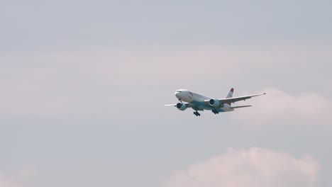 Austrian-Airlines-Boeing-777-2Z9-OE-LPB-approaching-before-landing-to-Suvarnabhumi-airport-in-Bangkok-at-Thailand