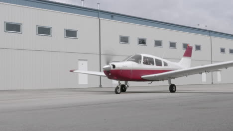 Small-Single-Engine-Piston-Airplane-at-Airport-Ramp