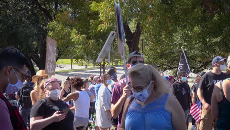 People-carry-YOU'RE-FIRED-signs-outside-Texas-Capital-in-downtown-Austin-after-Biden-defeated-Trump-in-2020-US-Presidential-election