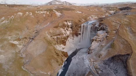 Distant-Aerial-view-of-a-waterfall-in-Iceland-called-Seljalandsfoss