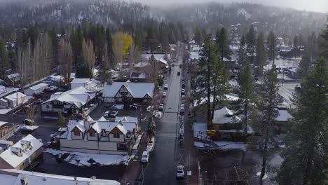 Beautiful-Small-Snowy-Christmas-Winter-American-Town-Landscape-During-Winter-Season,-Drone-Shot