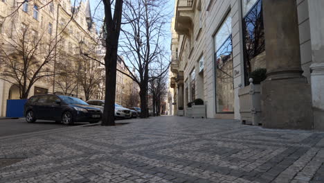 Empty-Paved-Sidewalk-and-Downtown-Street-in-Prague,-Czech-Republic-During-Corona-Virus-Pandemic,-Slow-Motion