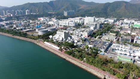 Cluster-of-Satellite-broadcast-Dishes-on-Asia-Pacific-Telecommunications-building-in-Hong-Kong,-Aerial-view