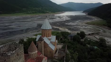 drone-shot-of-beatiful-mthseta-,-monastery-on-the-way-to-kazbeki